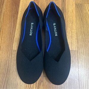 Rothy's Elegant Black Flats with Blue Accent